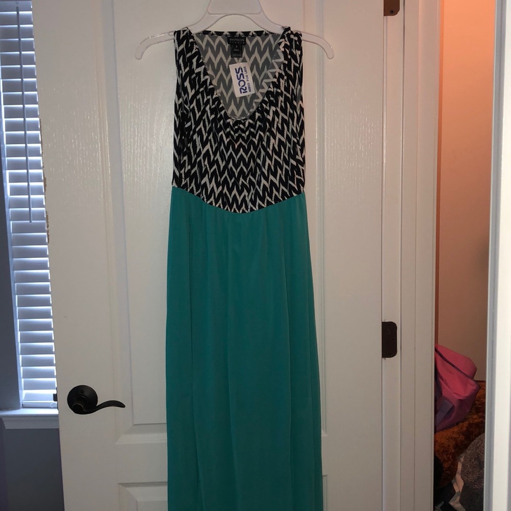 Long blue dress with black and white stripes